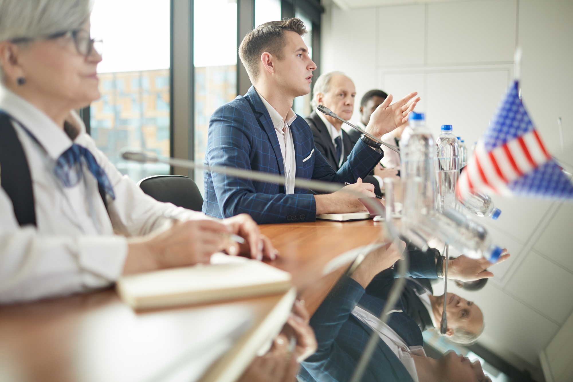 Business people discussing at conference